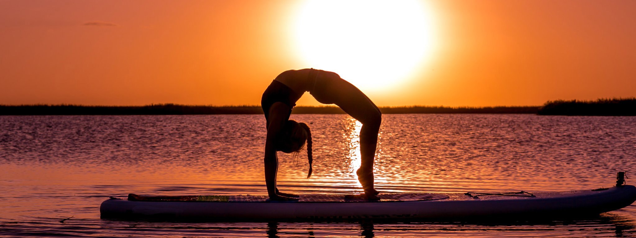 SUP Yoga: Benefits, Risks, and Workouts
